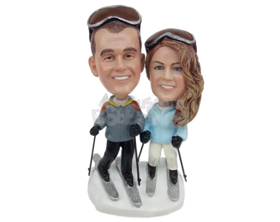 Ice Skiing Couple Wearing Fancy Winter Tracksuits Personalized Bobblehead Ice Skiing Couple Wearing Fancy Winter Tracksuits Personalized Bobblehead